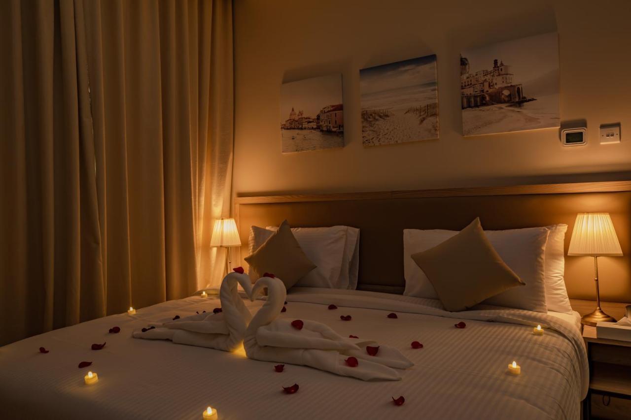 Platinum Coast Hotel Apartments Fujairah Ngoại thất bức ảnh A bedroom at the hotel