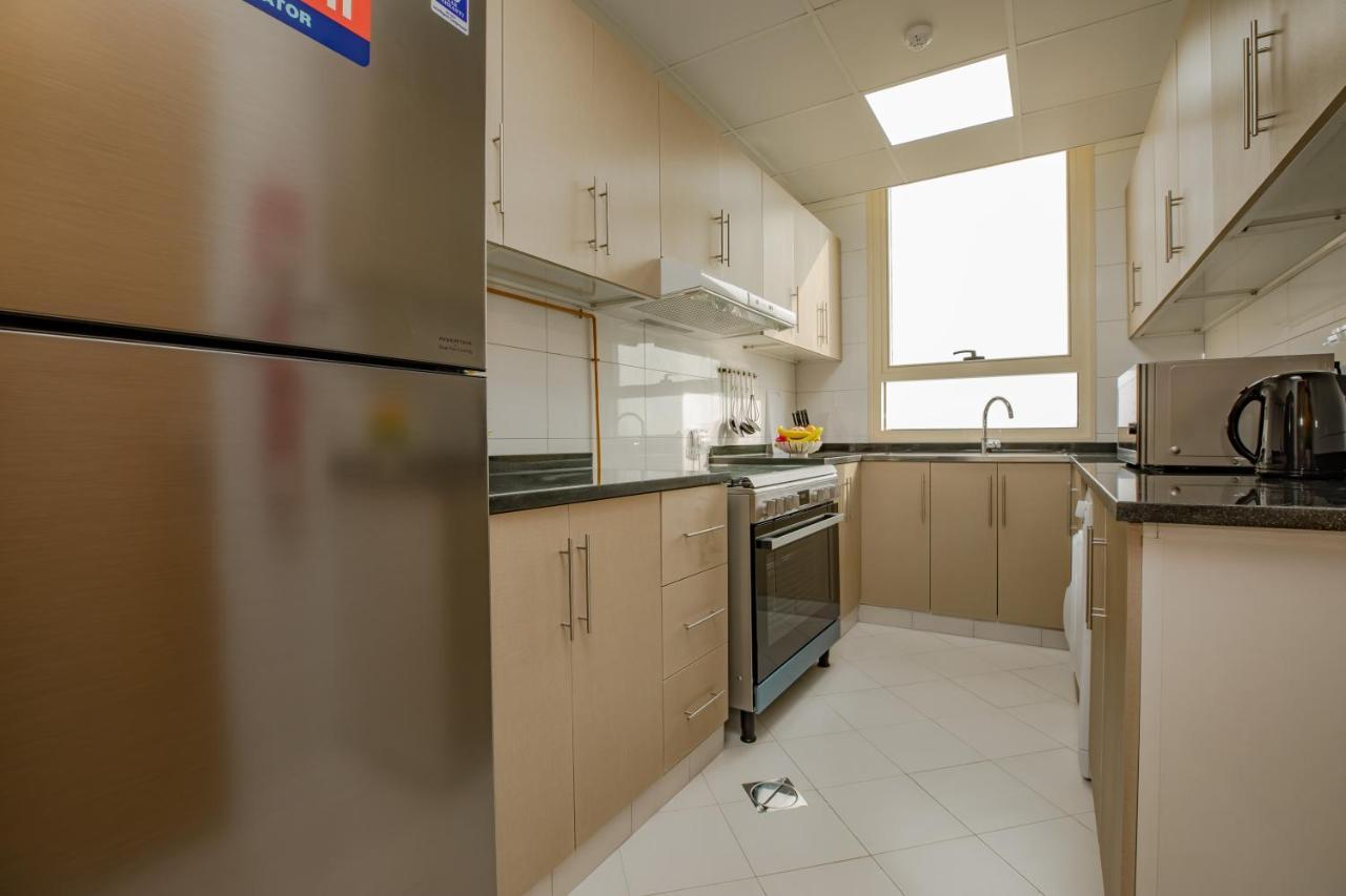 Platinum Coast Hotel Apartments Fujairah Ngoại thất bức ảnh A typical kitchen